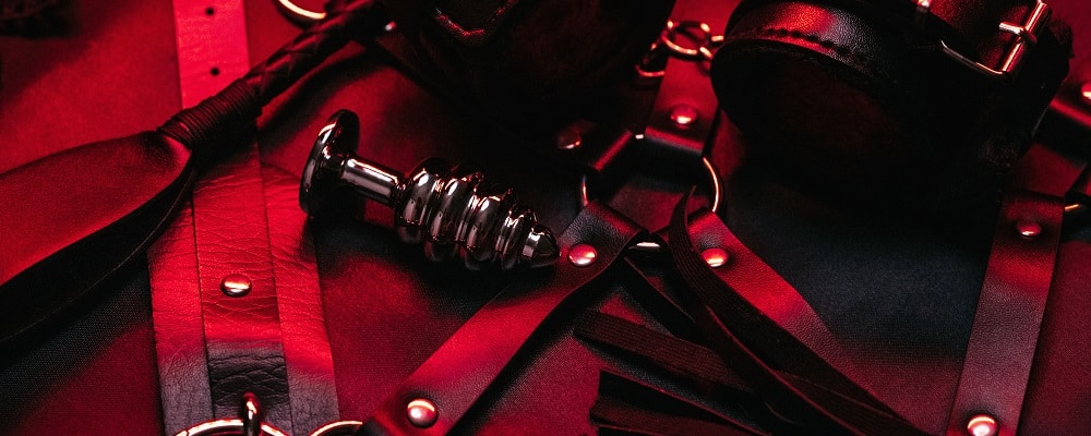 set of BDSM sex toys with handcuffs