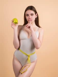 model with measuring tape